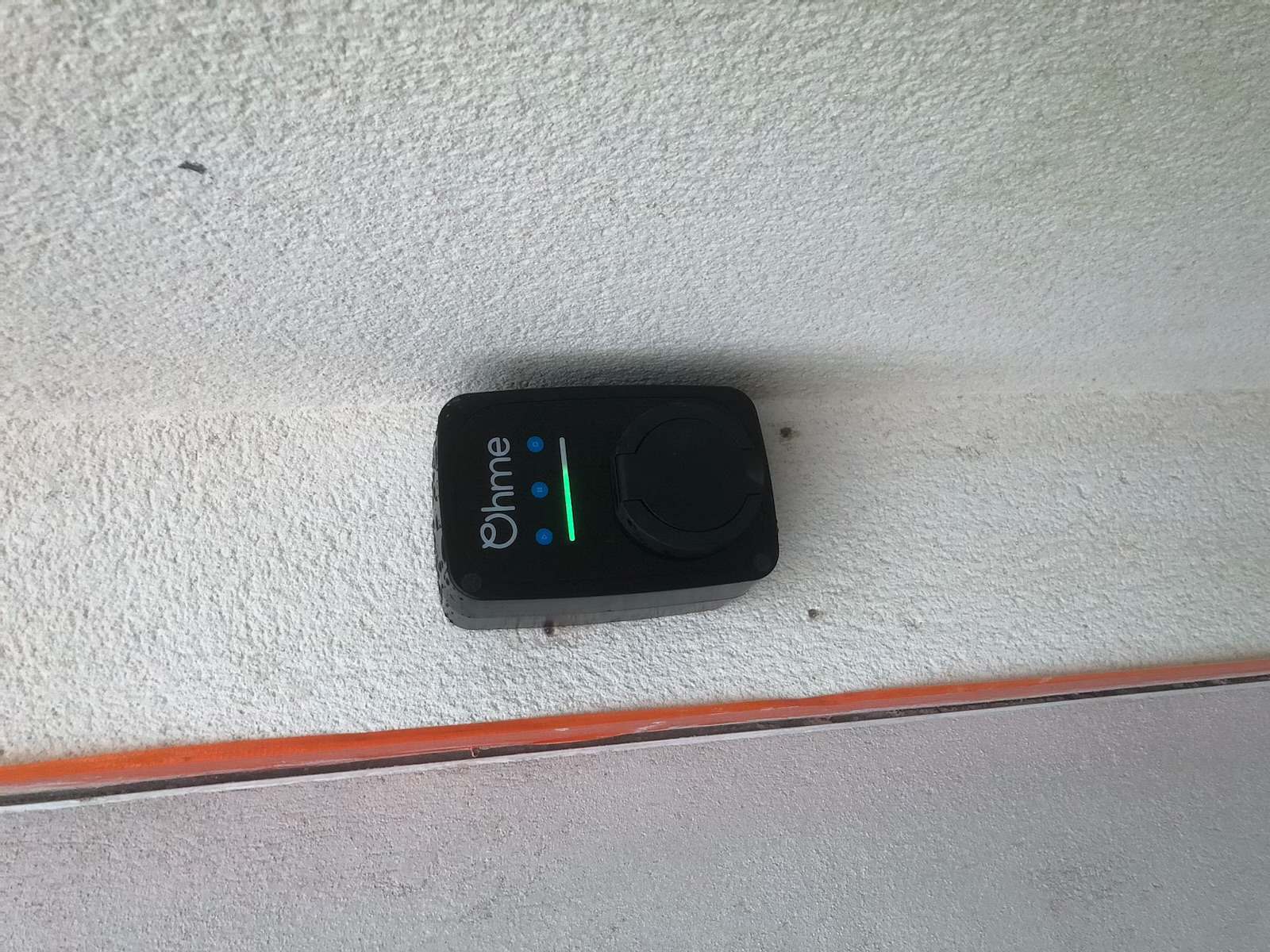 Open EV charger showing internal wiring
